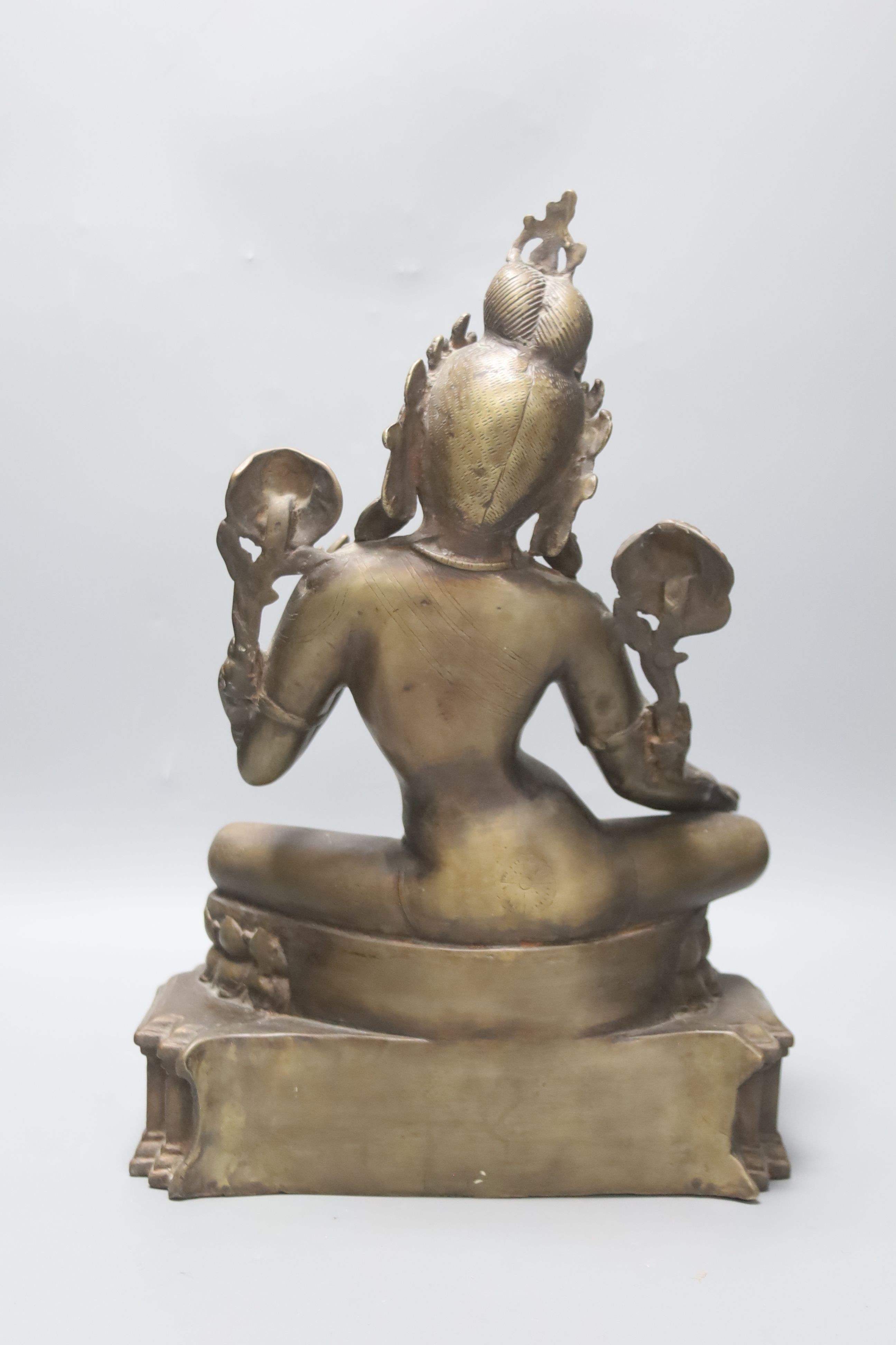 A large Himalayan bronze figure of Green Tara, early 20th century, 42cm